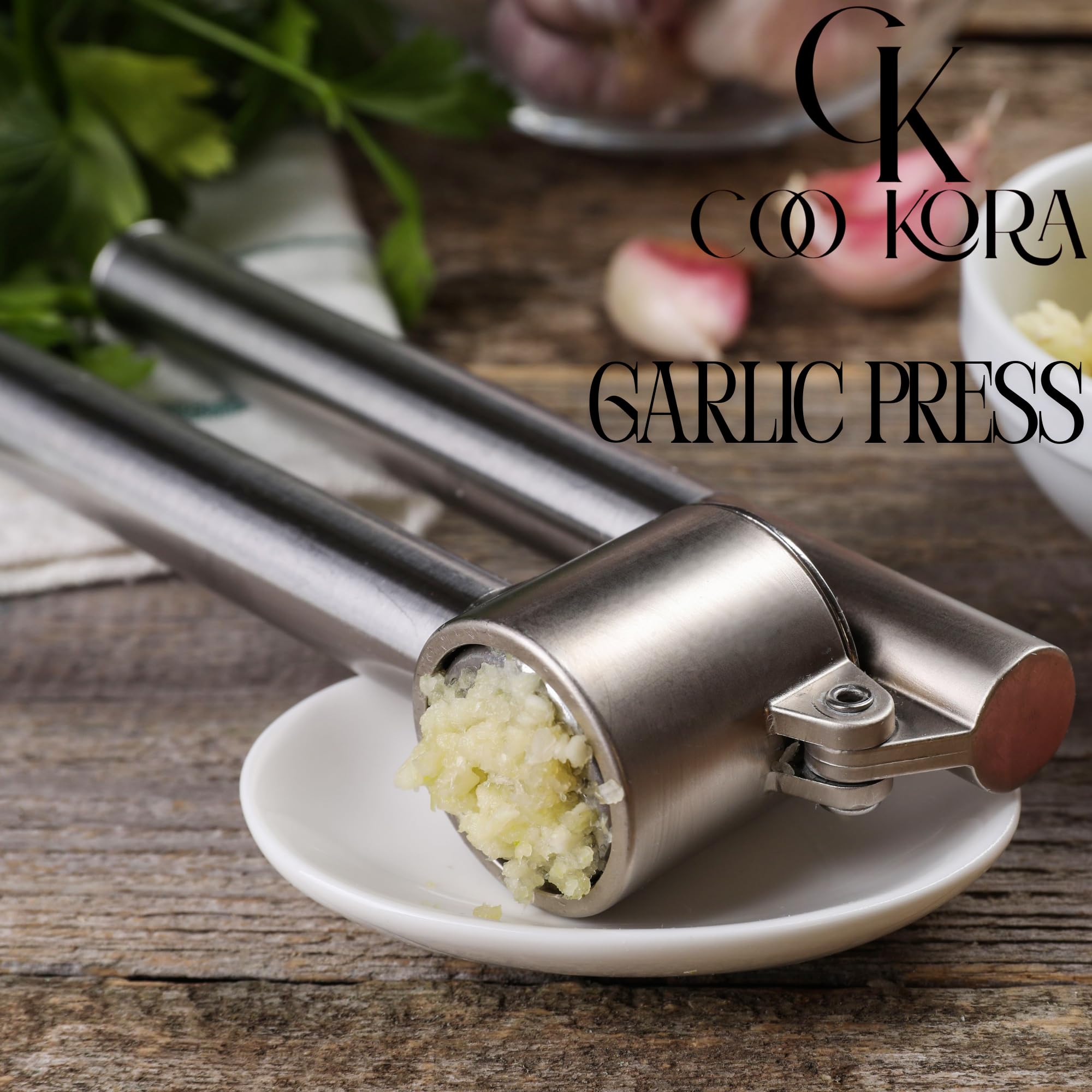 COO KORA Heavy Duty Garlic Press, Handheld Garlic Mincer, 304 Stainless Steel Garlic Press, Ergonomic, Durable, No Hand Odor, Just Put It in the Bowl, Dishwasher Safe